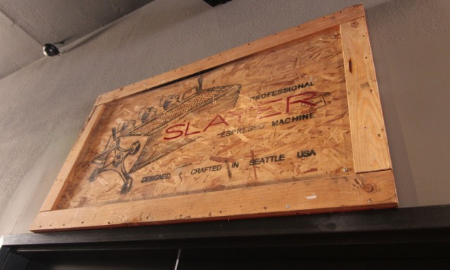 The Slayer shipping crate hangs proudly on the wall.