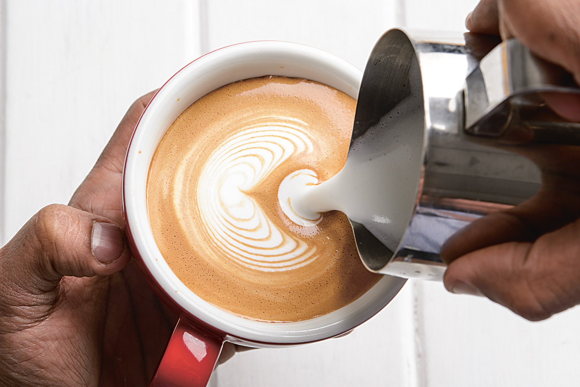 The Art Of Pour An Interview With Coffee Art Author Dhan Tamang