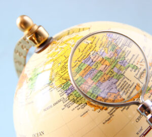 world globe magnifying glass