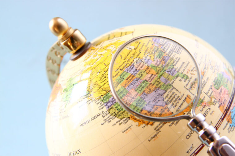 world globe magnifying glass