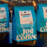 joe coffee comapny three bags at sunset