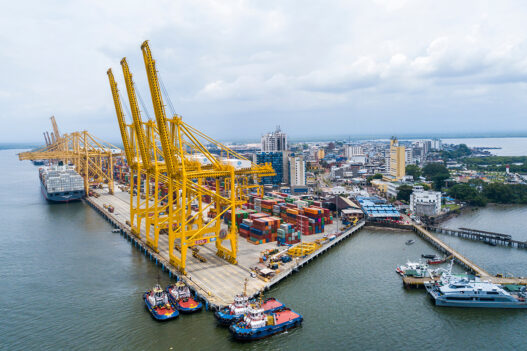 buenaventura industrial port aerial view with yellow cargo crane