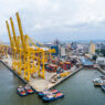 buenaventura industrial port aerial view with yellow cargo crane